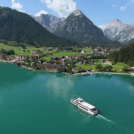 Alpenherz Апартаменты Пертизау